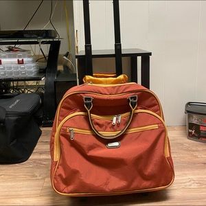 Baggallini carry on rolling bag